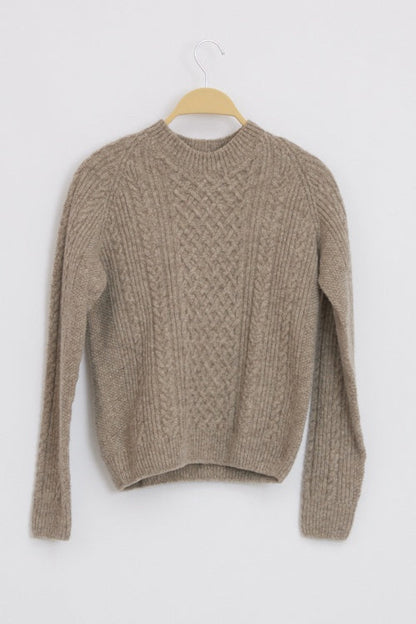 Pull en laine à torsades pour femme